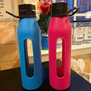 Set of Pink & Blue Takeya Glass Water Bottles with Sleeve